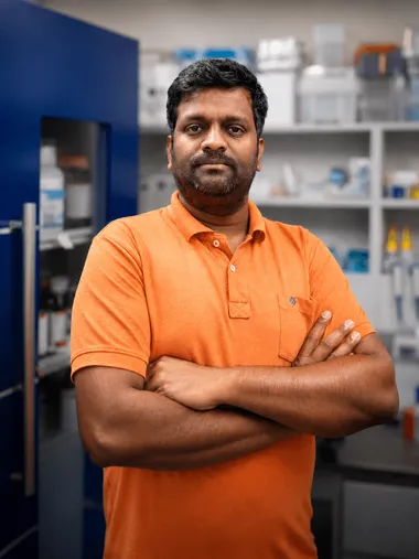 Prabakaran Shankar standing in a materials science research laboratory